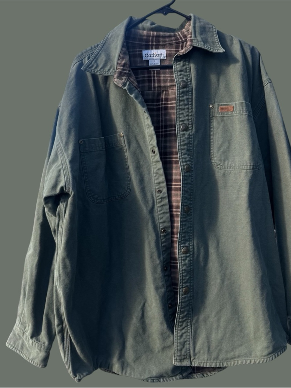 green carhartt snap button jacket
flannel lined